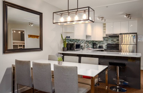 Upper Village Condo | 2BR | Powderhorn | Near Blackcomb Ski Area | Double Sided Fireplace | Rooftop Hot Tub | Parking