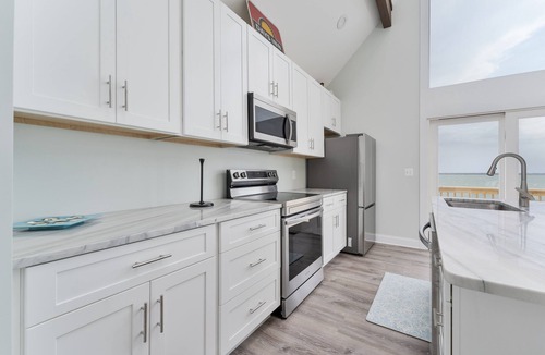 Colington Harbour House | 5260-Shenanigan's, 3BR Soundfront Home | Gated Community Pool