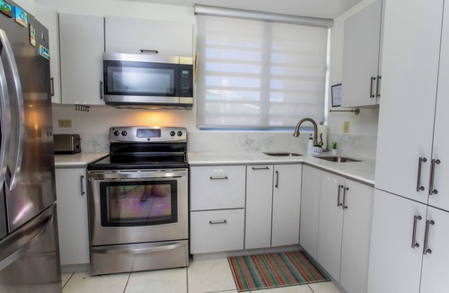 Ensenada House | Beachfront in gated community with patio, balcony, pool, close to all in Rincón