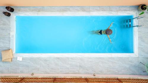 Spilia House | Cellar - Shared Pool & Nature Views