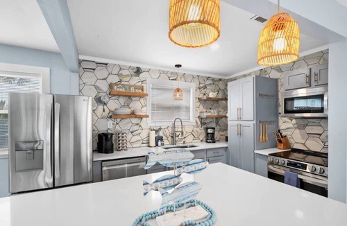 Butler Beach House | Heated Pool, Mini Golf, Walk to Beach, Beach Gear