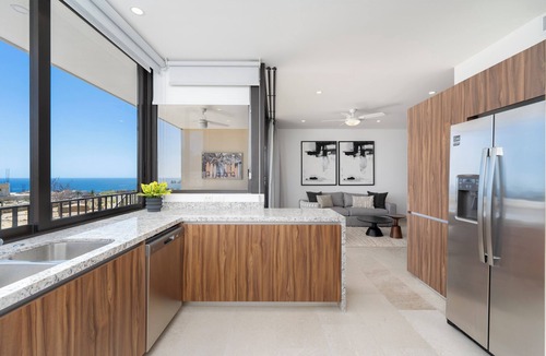 El Tezal Condo | Private and heated pool with arch view new condo!