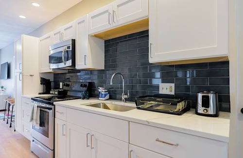 Malden Apartment | Spacious 4-bedroom Boston with WiFi, free parking