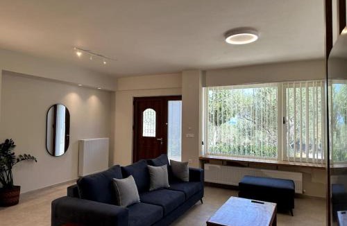 Gerani Apartment | Sunny flat among olive trees, next to the beach