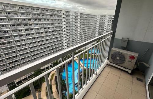 Barangay 76 Apartment | Tropical Balcony Pool View, 14th floor, MOA, Netflix, Airport at Shell Residence