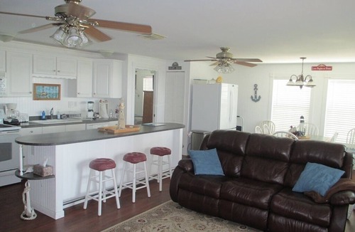 Dickinson House | Waterfront Bay House with Elevator, 350' Lighted Fishing Pier with Boat Lift.