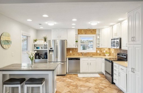 Colington Harbour House | Waterfront! Game Room, Hot Tub, Kayaks, Theater Room,Fire Pit, Comm Pool,Dogs OK