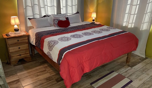 1 King bed, cable tv , wifi mini fridge stocked with welcome beer