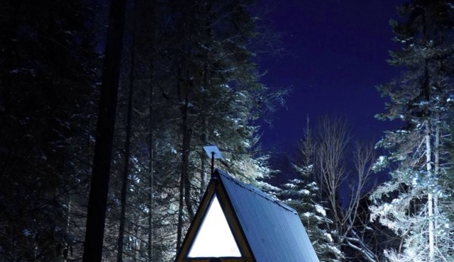 aframe in the woods.
