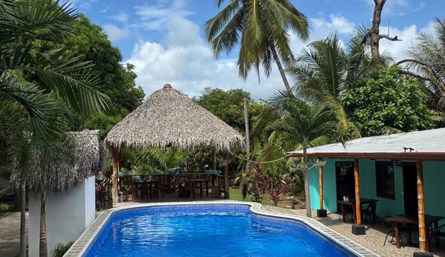 Beachfront Escape in Esterillos Centro - Pool, A/C, WiFi & Private Rooms
