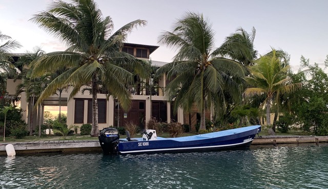 Beautiful Beachfront Island Home, Private Dock, Village Transportation Included