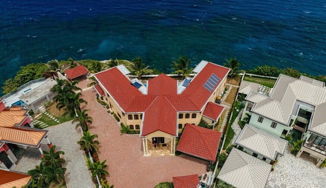 Breathtaking Oceanfront Luxe Villa in Tower Isle, Jacuzzi, Pool, Fully Staffed