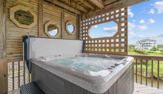 Canalfront Home in Avon with Hot Tub, Private Boat Dock, Kayaks, and Game Room