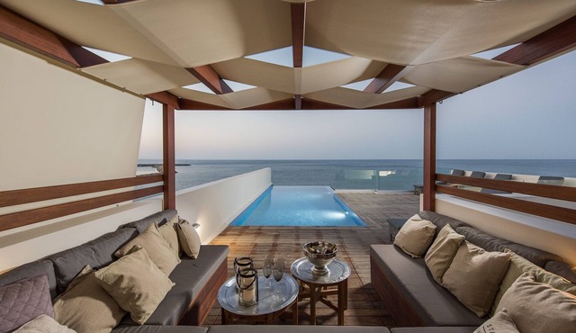CELESTINE, beach front villa with roof top pool and spectacular views.