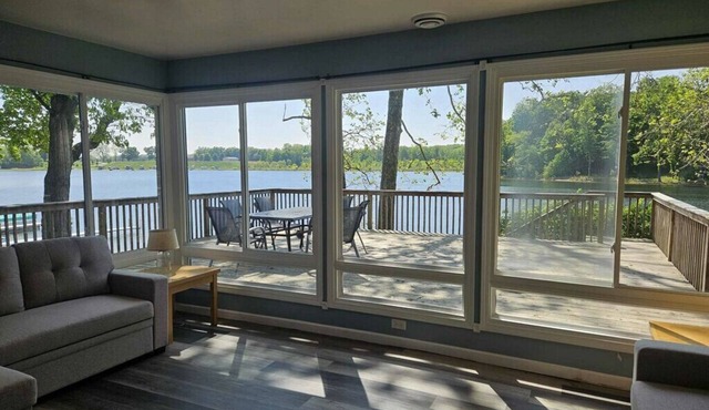 Charming Lakefront Retreat with Sandy Beach – Perfect Getaway