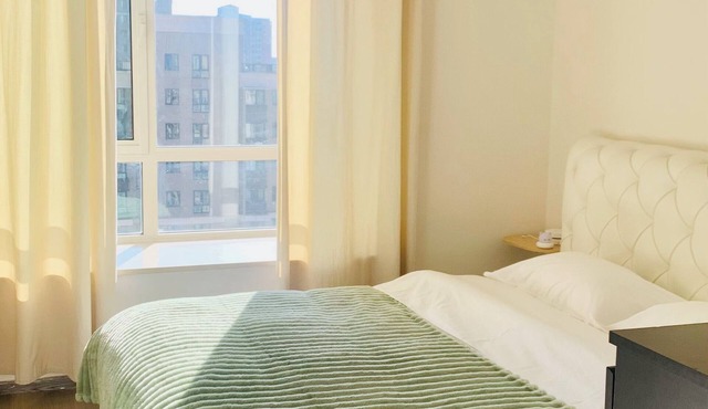 Charming shared separate room in 4bedroom Apt in Beijing downtown with AC, WiFi