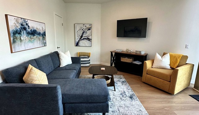 Clean, bright, with large exclusive patio, parking, close to airport and beach