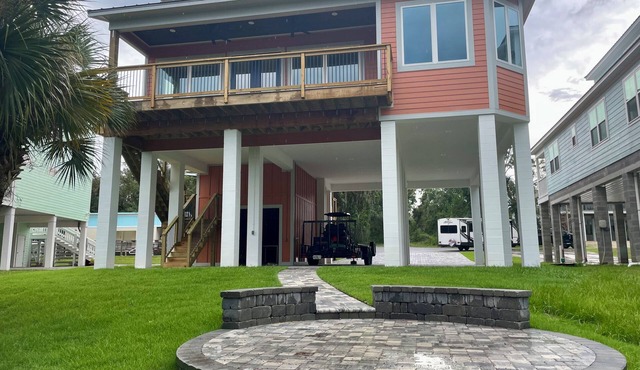Cozy 4 bedroom 3.5 bath waterfront home with boat dock and slip.