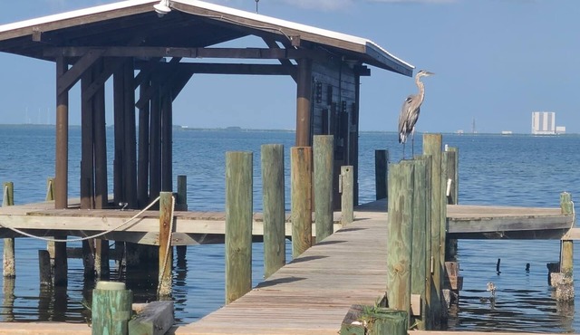 Cozy Getaway with a Dock Facing Rocket Launch Facilities Across the Indian River