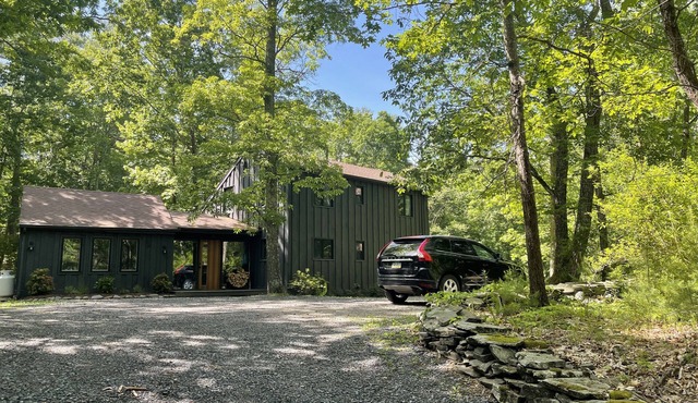 Experience Woodstock charm while staying in a cozy cabin in the woods