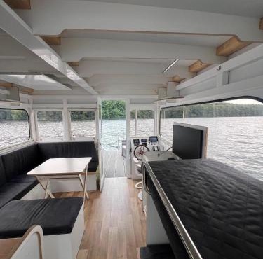 Hausboot Rollyboot Evolution- feste Unterkunft am Steg