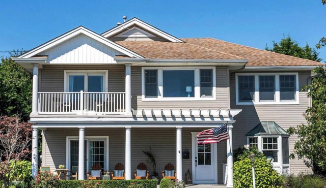 Lake views in this renovated 4-bedroom house in charming Spring Lake