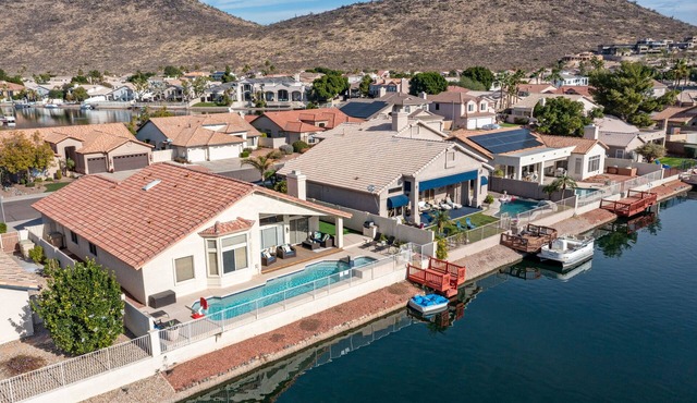 Lakefront Home complete with Mountain Views, Pool, Putting Green & Paddle Boat!