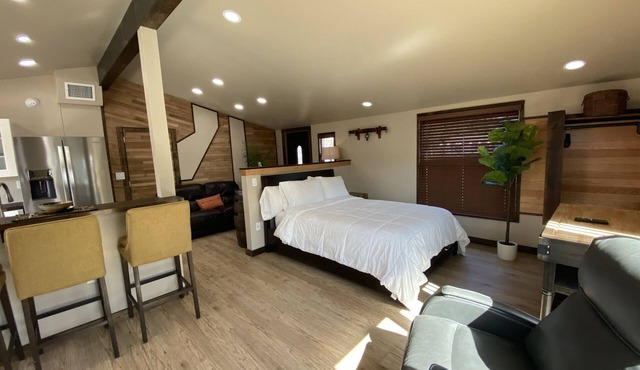 Modern Ranch Studio With a Beautiful Round Porch