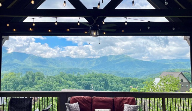 STUNNING MOUNTAIN VIEWS! Multiple HUGE Decks, Game Room, Fire Table, Hot Tub!