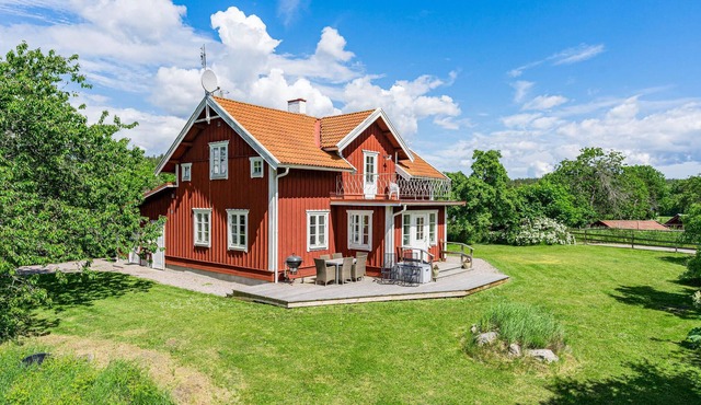 This modern cottage awaits your visit in a beautiful area, close to Kolmården Animal Park and not fa
