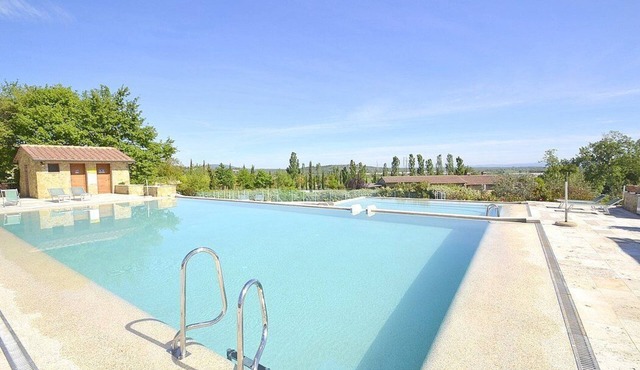Villa Fontanile E: An elegant and welcoming apartment that is part of a small villa surrounded by the greenery, with Free WI-FI.